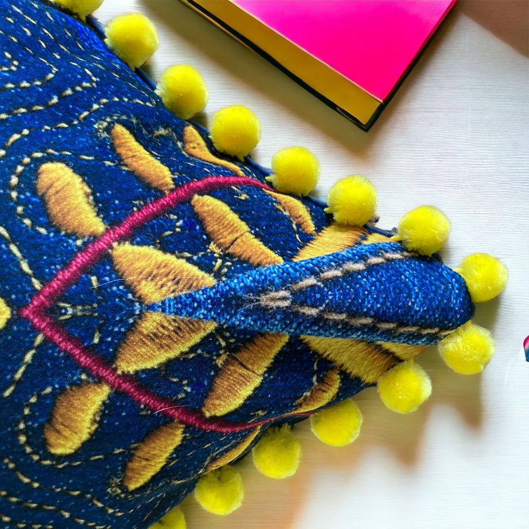 Alison-Morrish-Cushion-embroidery-luxe-digital-print-eco-velvet-kaleidescopic-print-blue-yellow-pom-poms-feather-filling-british-artisan