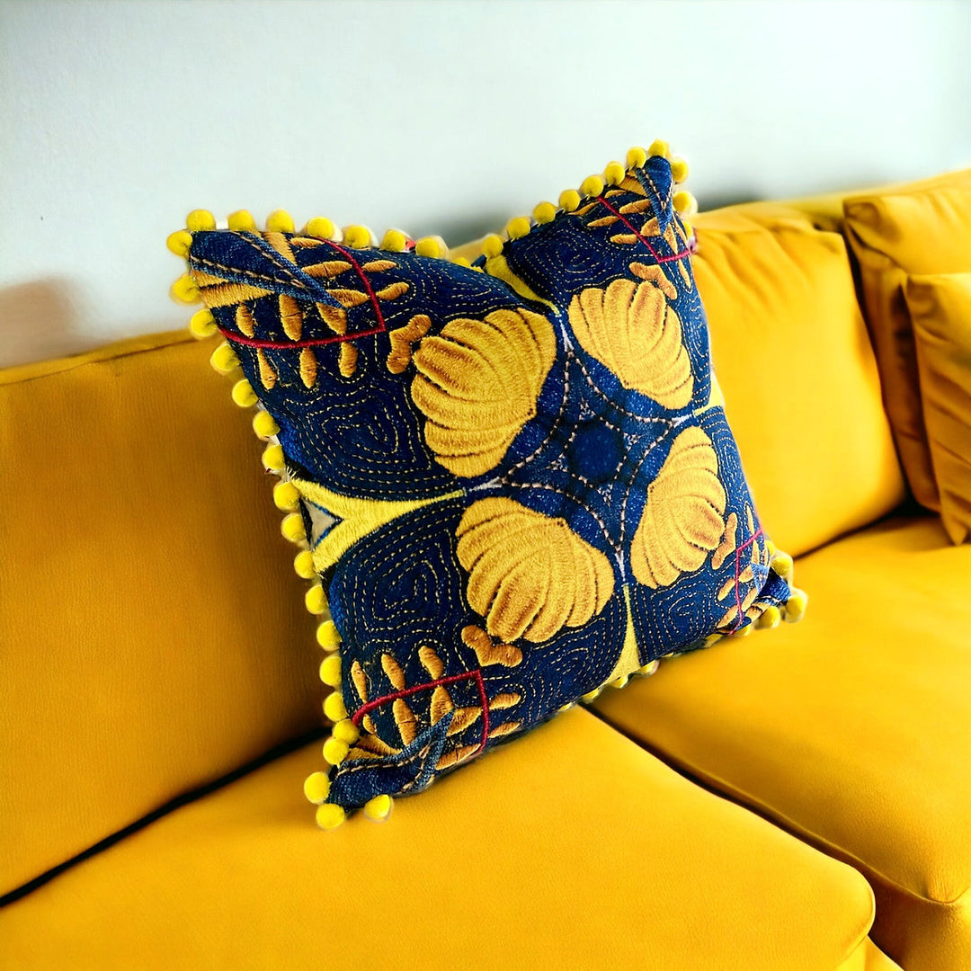Alison-Morrish-Cushion-embroidery-luxe-digital-print-eco-velvet-kaleidescopic-print-blue-yellow-pom-poms-feather-filling-british-artisan