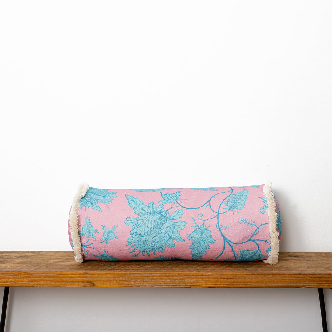 wear-the-walls-bolster-cushion-in-hermosa-pink-turquoise-vine-printed-velvet-fringed-edges-throw-cushion