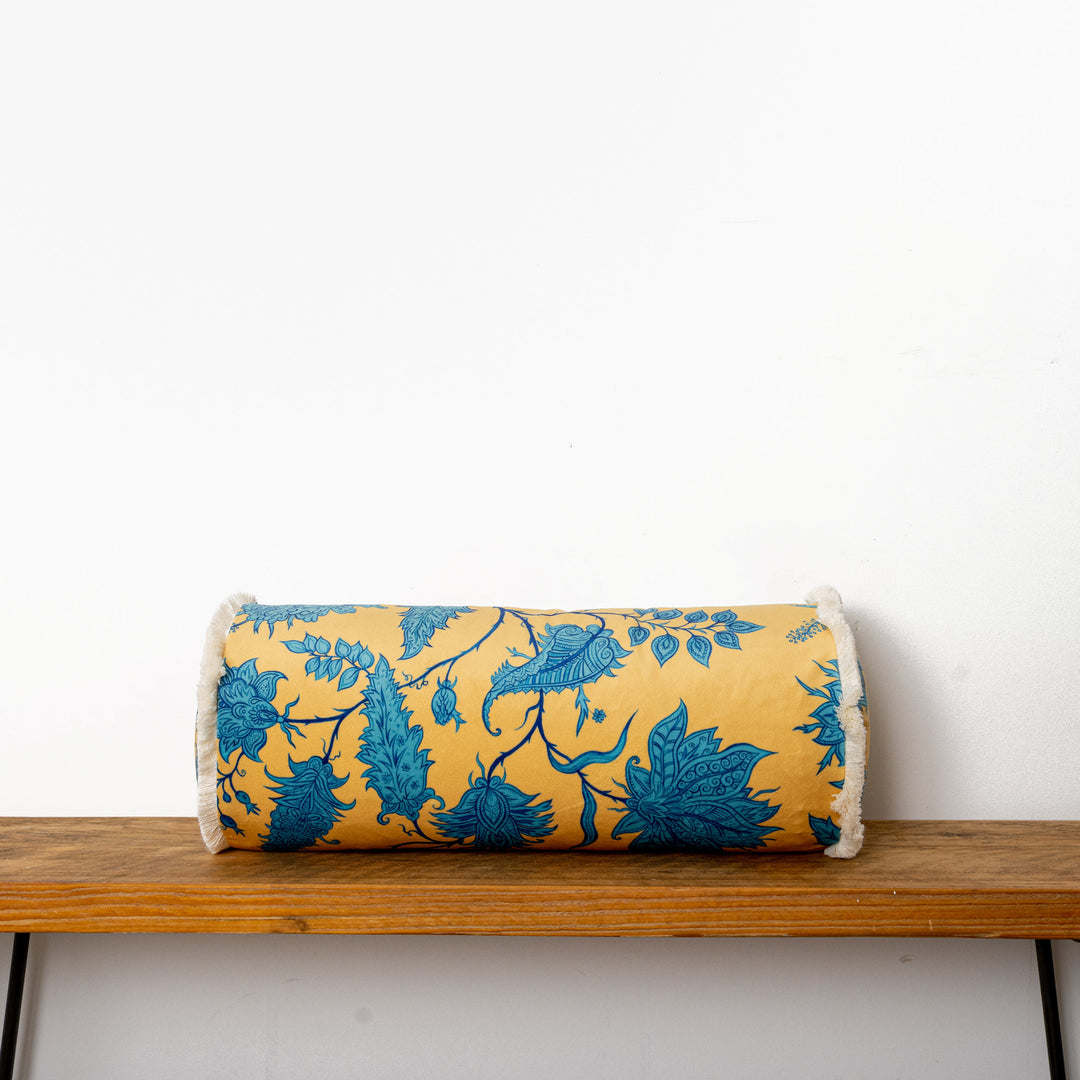 wear-the-walls-bolster-cushion-in-hermosa-citrine-zircon-velvet-trimmed-yellow-turquoise-vine-print