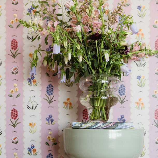 Wear-the-walls-mavis-wallpaper-scalloped-edged-embroidery-detailed-pink-white-floral-vintage-looking-wallpaper