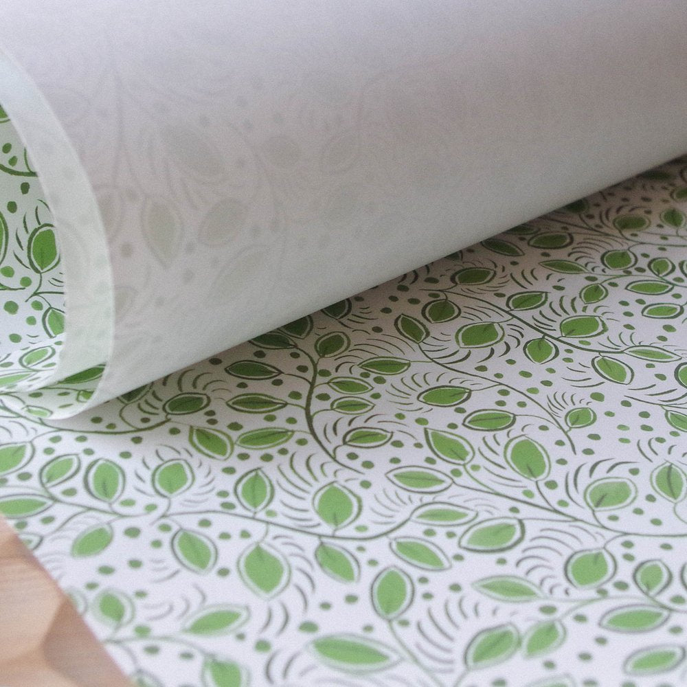 Lowri -Studio-wallpaper-little-leaves-green-white-fresh-trailing-ditsy-print-eco-substrate-wallpaper-