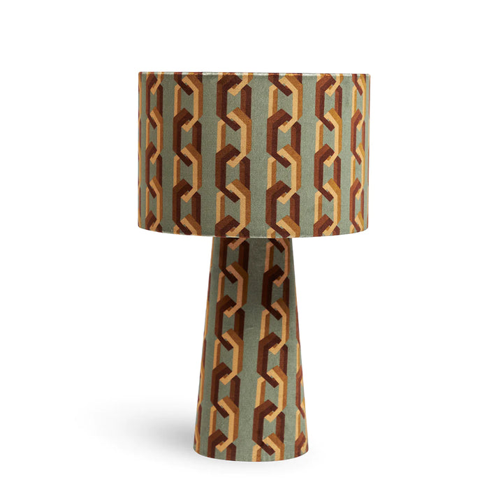 Chain-of-fools-velvet-drum-table-lamp-jade-retro-pattern-velvet-link-design-teal-grey-background-brown-links-poodle-and-blonde-lighting