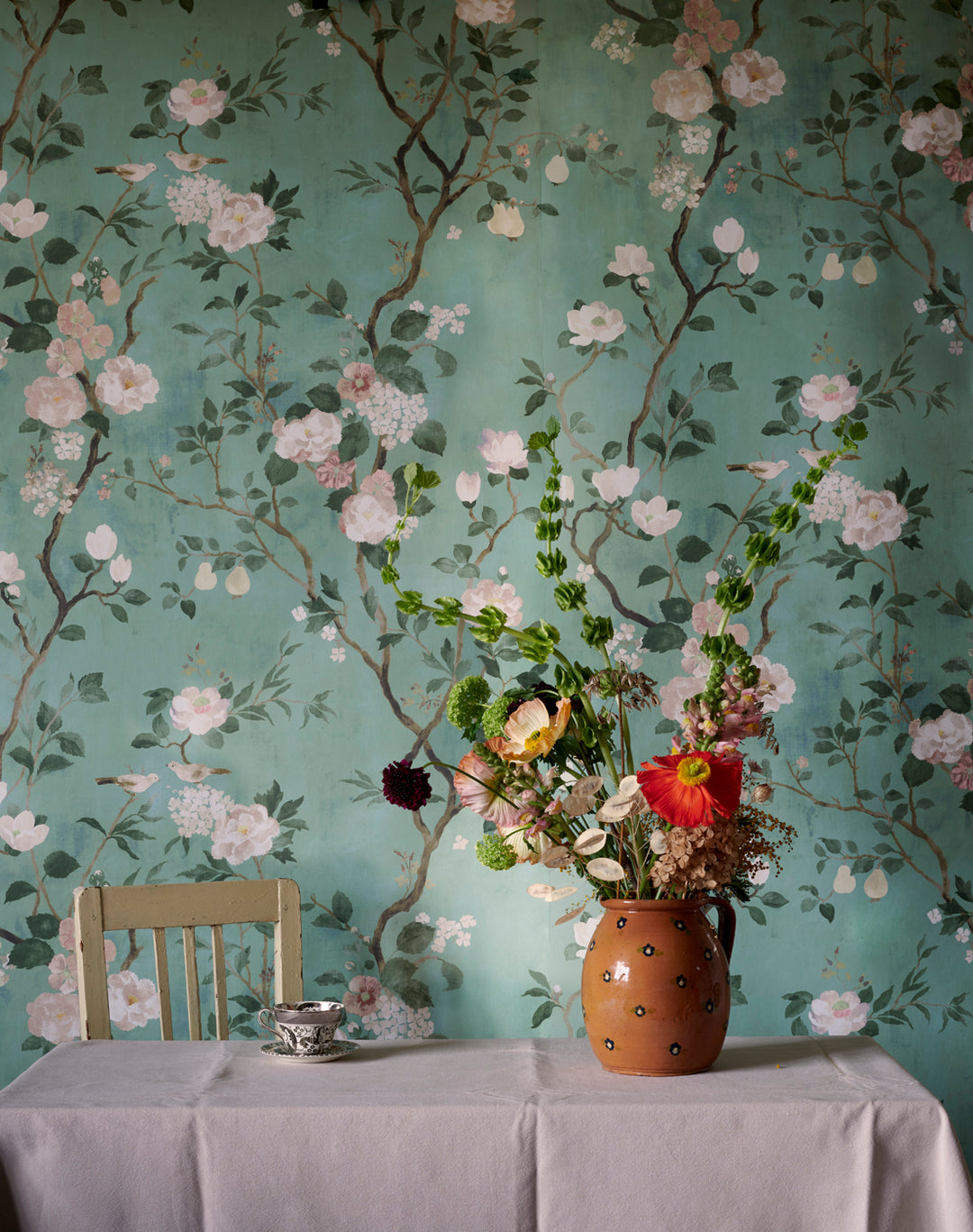 Flora-Roberts-Wallpaper-Hamilton-Weston-Peony-Garden-wall-mural-trailing-garden-prony-blossom-flowers-birds-pears-green-Celadon