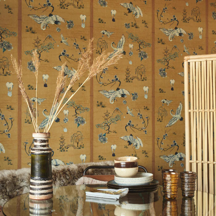 poodle-and-blonde-wallpaper-chinoiserie-style-wallpaper-cheeky-twist-storks-delivering-take-away-food-parcels-vintage-slub-silk-background-hand-embroidery-storks-stripes-digitally-reprinted-design-textile-effect-chinese=classic-wallpaper-camel-soft-brown 