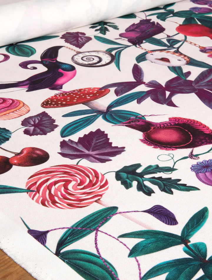 witch-and-watchman-Amazonia-pattern-surreal-tea-party-alice-in-wonderland-themed-fabric-birds-fruit-mushrooms-white-base-light-option-textiles