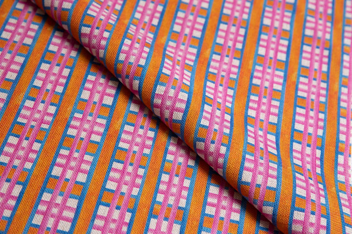 Bethie-tricks-textiles-cheerful-check-blue-white-pink-against-orange-retro-tartan-printed-linen-watercolour-faded-tile-influenced-textileb