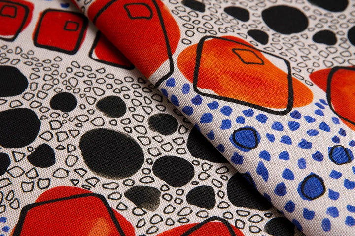 Bethie-tricks-textiles-cellular-spots-organic- forms-black-surface-spot-shaped-like-print-Flax-linen-black-orange-indigo