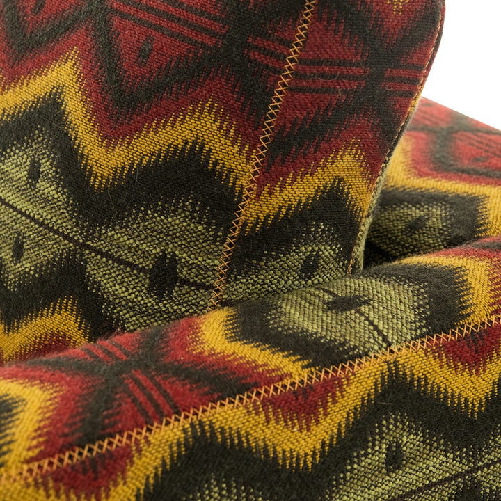 Mind-the-gap-Maverick-retro-style-chair-Pyramidenspite-Aztek-woven-fabric-upholstry-warm-colours-diamond-jacquard-style-faric-metal-legs-yellow-stitching