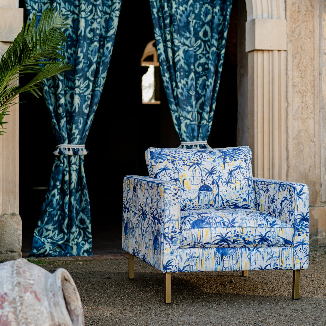 Mind-The-Gap-Maverick-Chair-Rhodes-Greek-style-architectural-fabric-print-palms-sunshine-white-blue-yellow-print-mis-century-style-shape-retro-classic-styling-antique-wood legs-hand-made-furniture