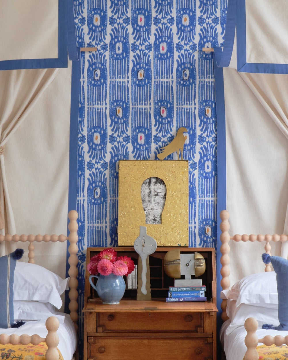 ikat-carnival-blue-wallpaper-minnie-kemp-mindthegap-collaboration-childrens-bedroom-two-single-beds-with-canopes