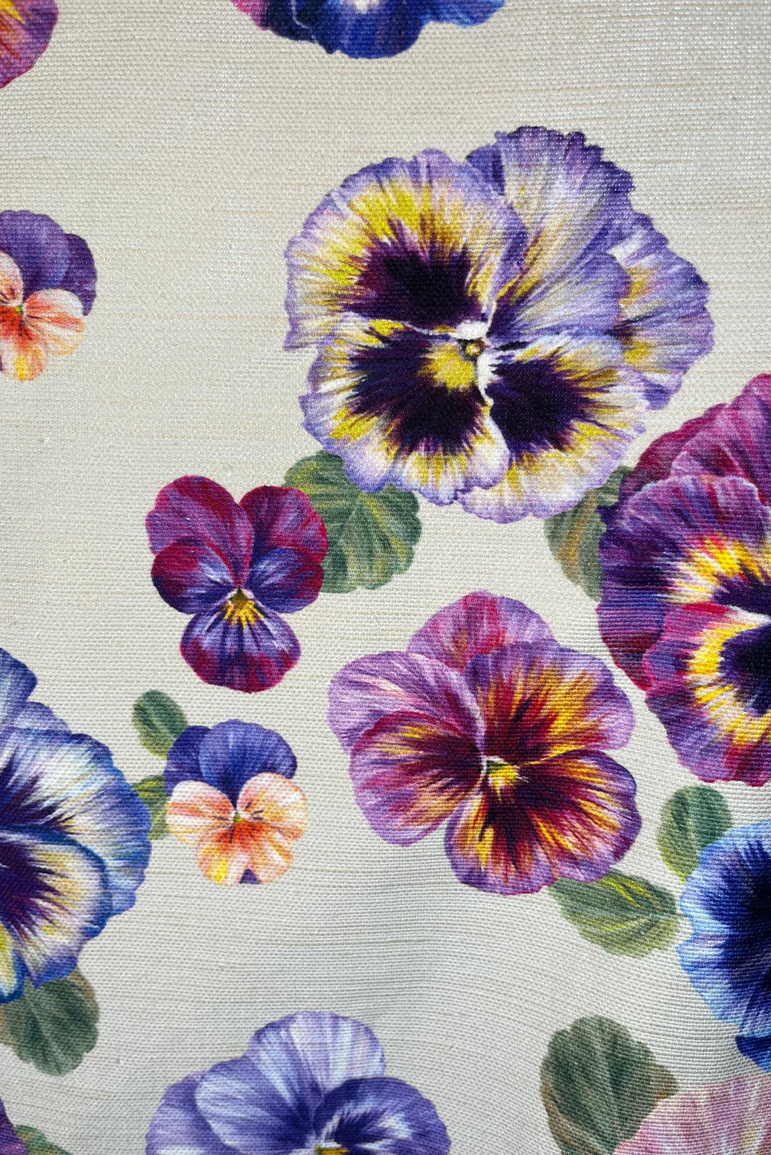 Victoria-sanders-fabrics-plethora-of-pansies-ston-background-hand-painted-floral-oyster-linen-textile