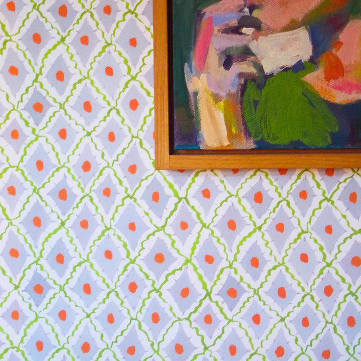 Lowri-studio-wallpaper-diamonds-green-harlequin-pattern-blue-diamonds-orange-spots-green-trim-diamond-pattern-wallpaper-non-woven