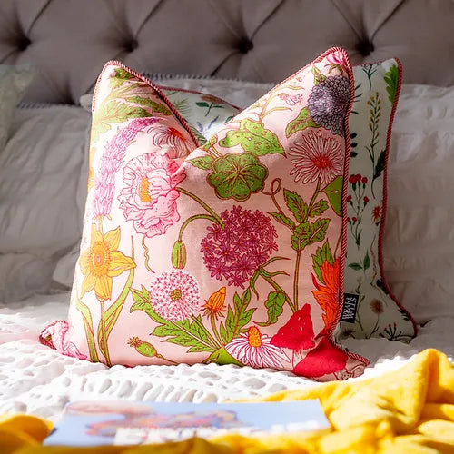 wear-the-walls-medium-reversible-linen-cushion-in-bloom-sonder-pink-floral-bright-florals-on-white-linen-pipped-trim