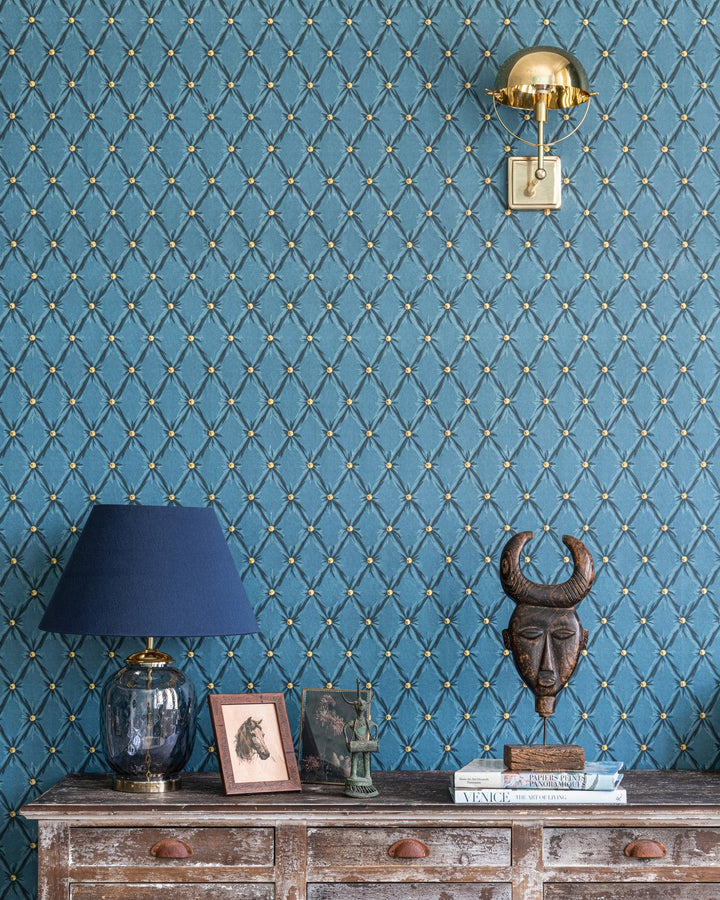 Mind-the-gap-wallpaper-orient-express-tufted-panel-velvet-chesterfield-style-padded-wall-gold-buttons-3d-effect-blue-moon-WP30170