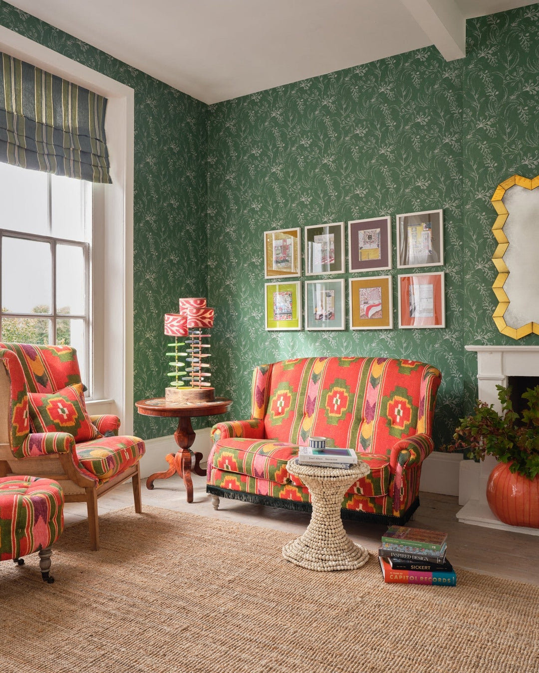 minnie-kemp-mindthegap-collaboration-blue-wallflower-block-print-floral-wallpaper-design-folk-green-lounge-red-patterned-sofas