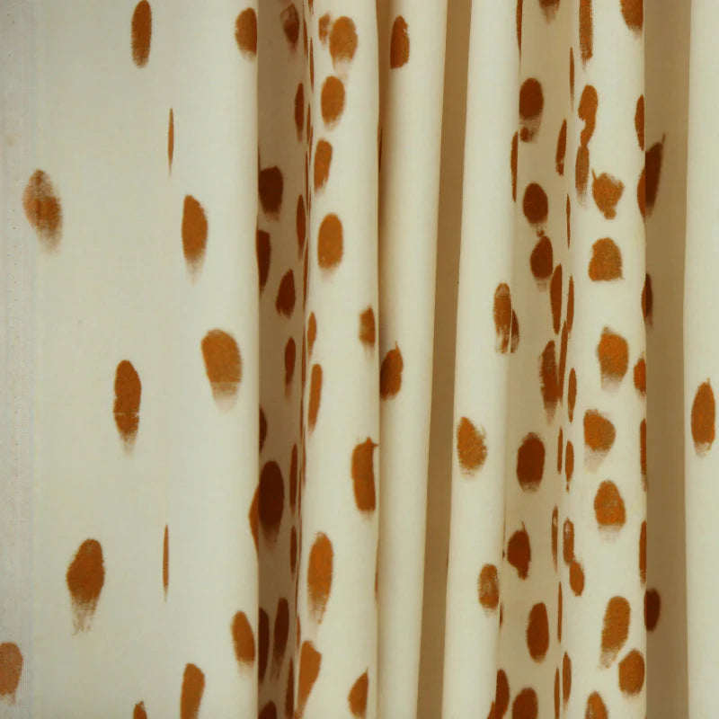 poodle-and-blonde-Dalmatian-print-tottenham-fabric-linen-spots-brushstroke-ginger-orange-on-white-linen-textile-spots