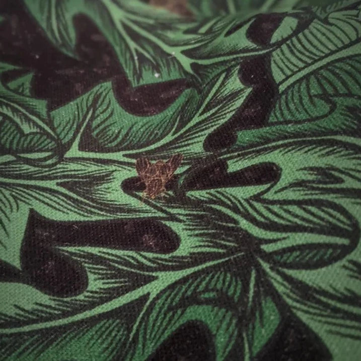 Hex-and-Henbane-Henbane-Linen-holly-pattern-gold-flies-textile-British-designer-fabrics