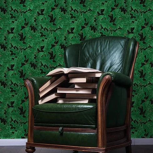 Hex-and-Henbane-Lucy-Bentley-Artisan-made-British-wallpaper-brand-Henbane-wallpaper-green-Holly-pattern-black-background-gold-bees-hand-illustrated 