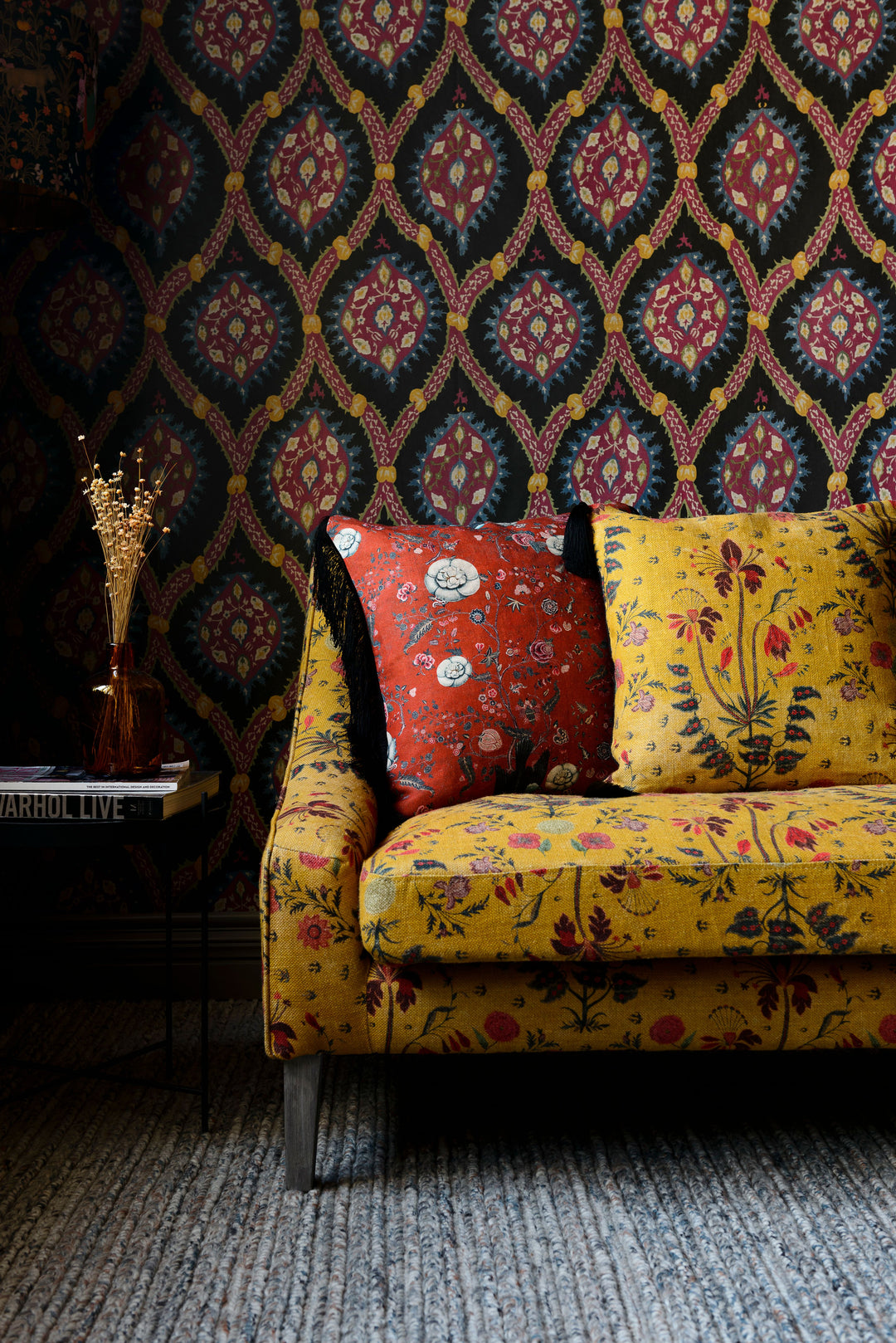 mind the gap linen cushion gypsy ochre black tassel red blackbird cushion yellow sofa lifestyle image