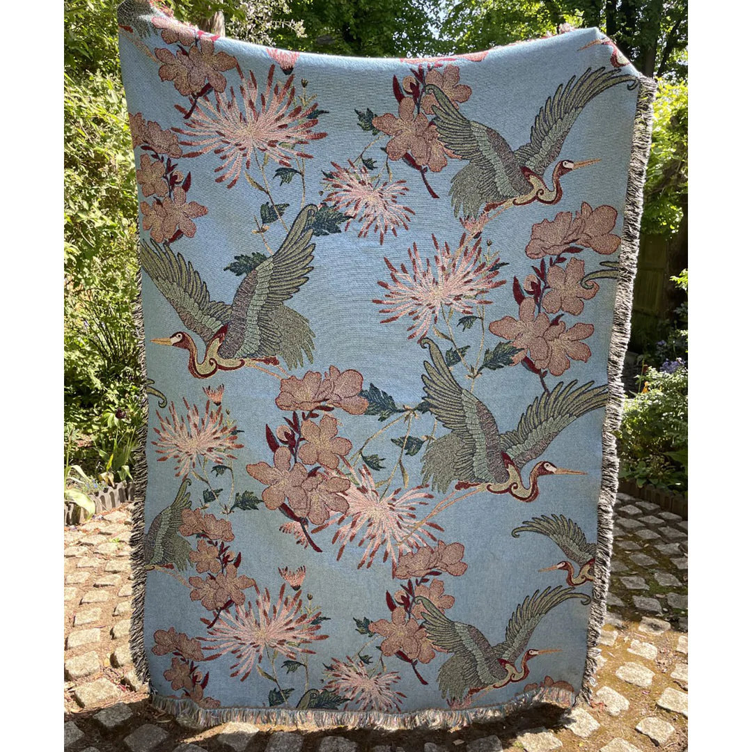 Tatie-Lou-throws-blankets-blssom-jacquard-knit-herons-birds-cranes-floral-reverse-woven-blanket-cotton-edge-blue-pink-cream
