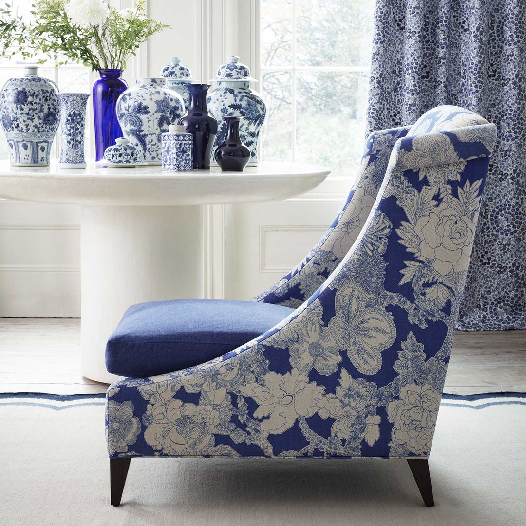 liberty-fabric-interiors-zennor-arbour-ladbroke-linen-floral-linen-drawing-fabric-curtains-cushions-upholstery-floral-blue-white-upholstered-chair-blue-white-interior