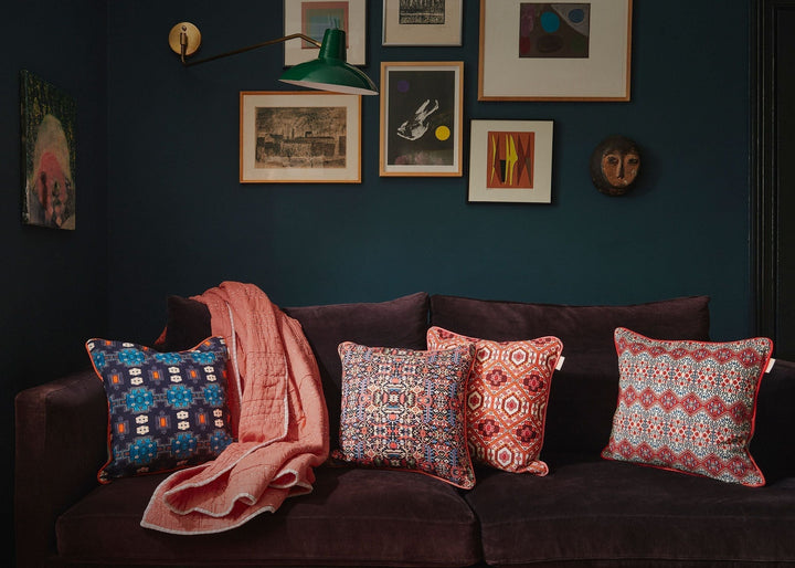 coloured-blue-red-british-designer-uk-made-blue-lounge-purple-velvet-sofaizziizzi-linen-cushions-geometric-astec-design-british-made-uk-designer-blue-orange-aztec-design-navyizziizzi-linen-cushions-geometric-astec-design-british-made-uk-designer-teal-orange-aztec-design-tile-pattern