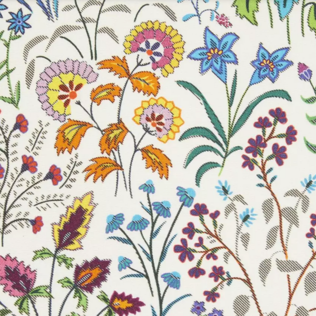 liberty-interiors-fabrics-shepherdly-flowers-cotton-satin-exotic-floral-dainty-fabrics-mult-coloured-white-background-100-cotton