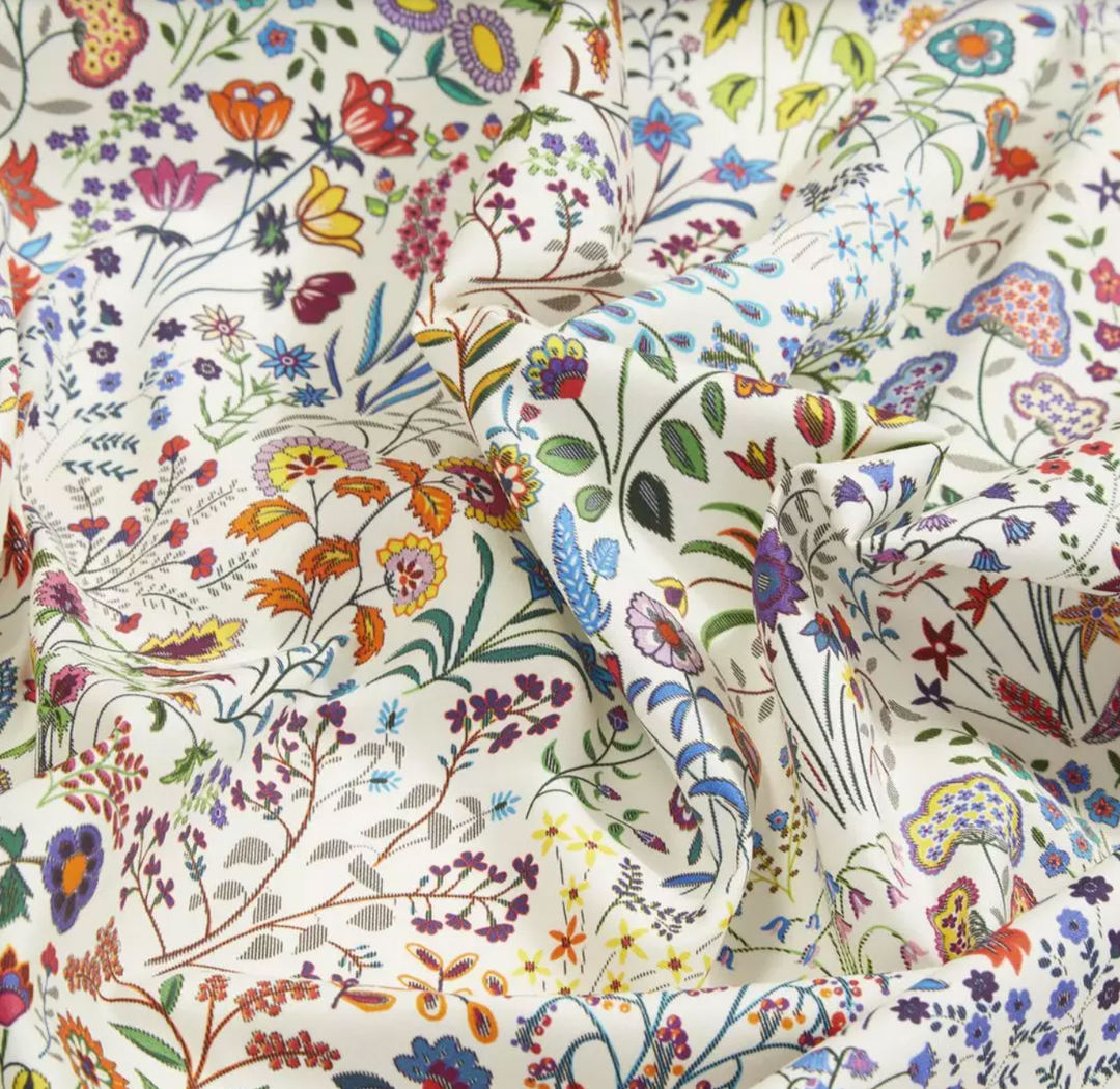 liberty-interiors-fabrics-shepherdly-flowers-cotton-satin-exotic-floral-dainty-fabrics-mult-coloured-white-background-100-cotton