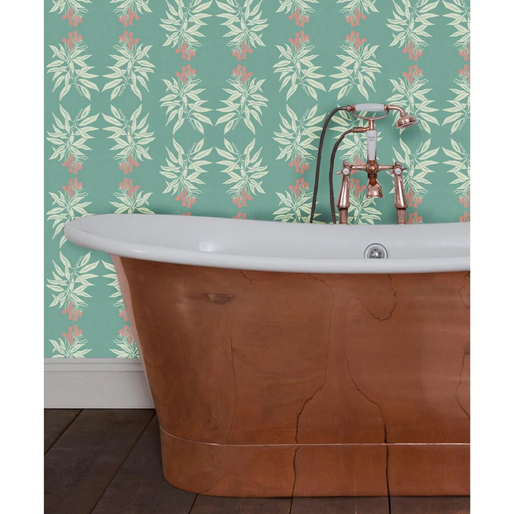 annika-reed-studio-wallpaper-branches-of-mango-flowers-leaves-mint-green-peach-pink-bathroom-wallpaper