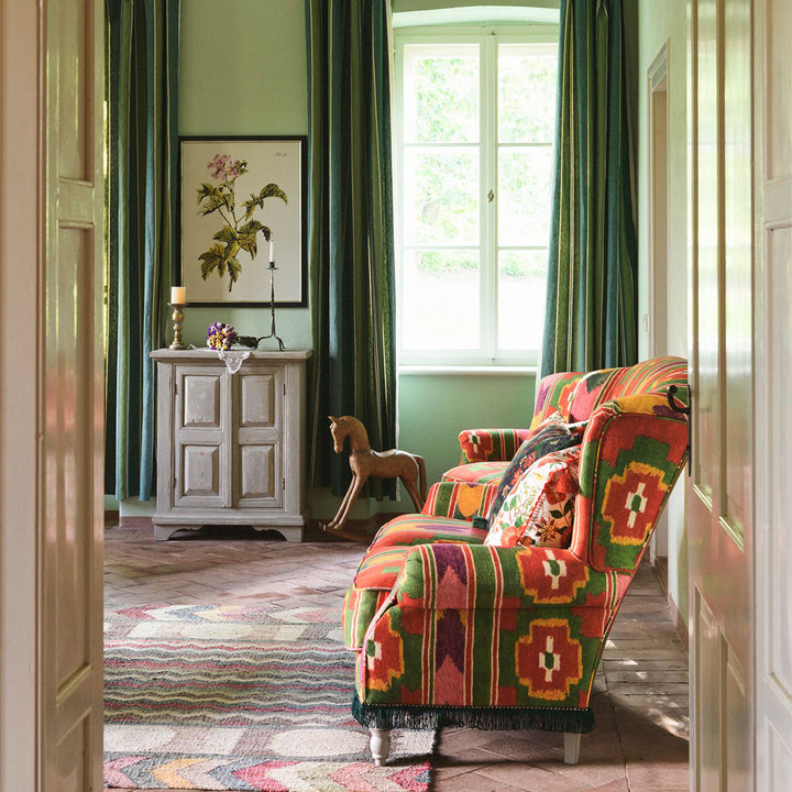 abigail-mind-the-gap-sofa-multi-coloured-linen-fabric-green-fringing-ikat-print-design-green-red-fresh-room-set-lounge