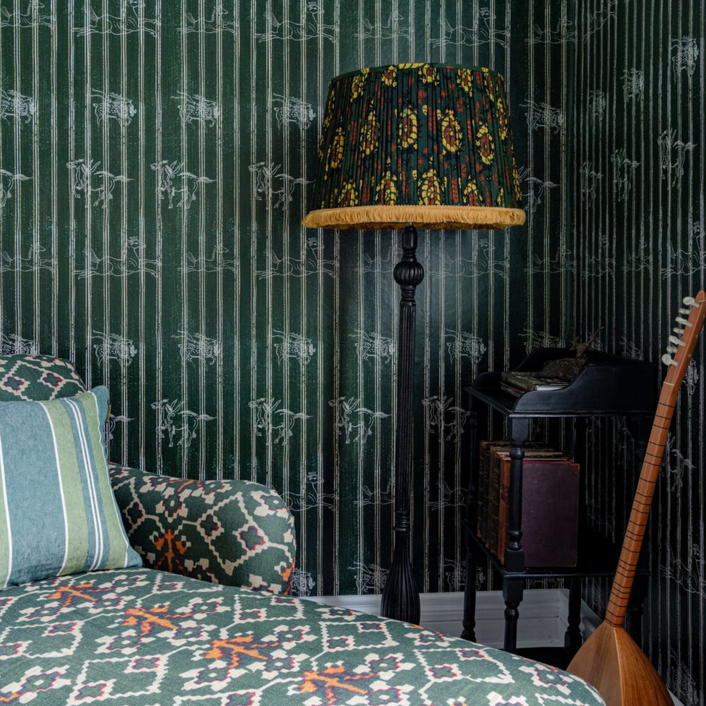 green-stripe-wallpaper-horses-lampshade-chaise-lounge-mind-the-gap-green-stripe-a-fable-evergreen-wallpaper-horses-with-wings-transylvanian-roots-collection-maximalist-statement-interior