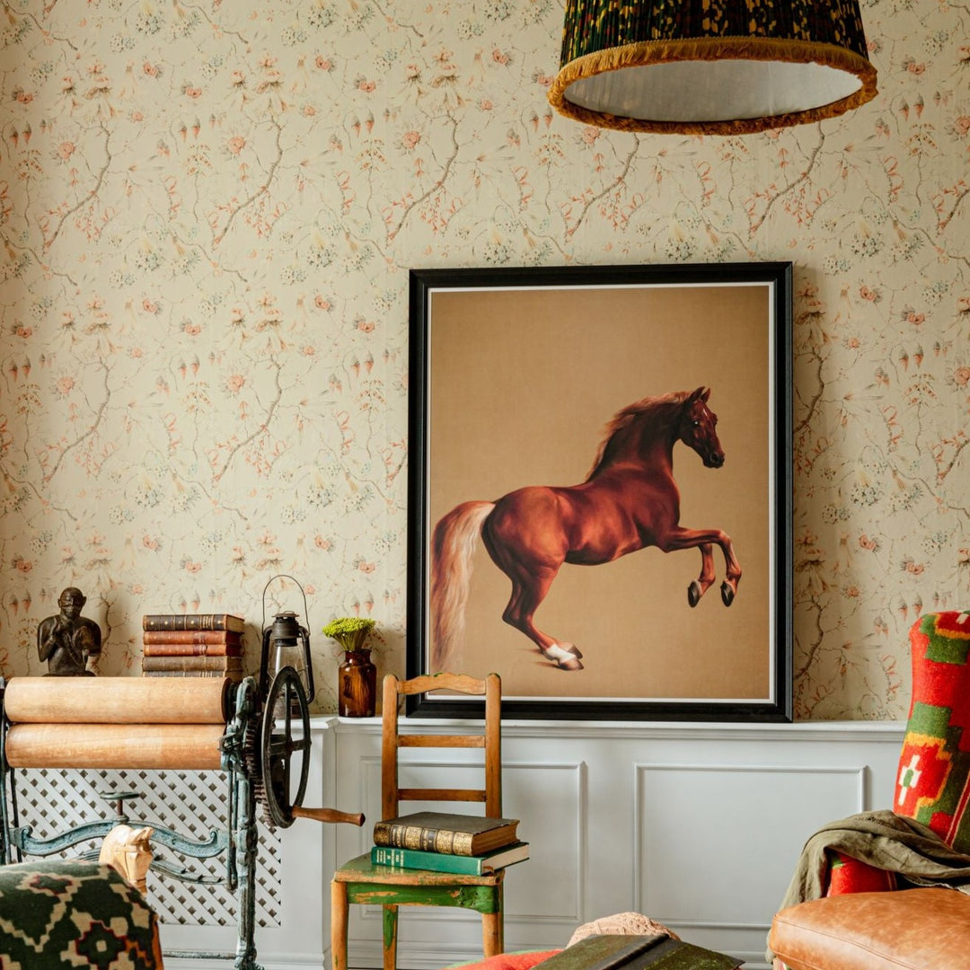 living-room-soft-floral-pattern-wallpaper-horse-picture-blue-grey-pink-floral-blossom-mind-the-gap-grandma's-tapestry-wallpaper-transylvanian-roots-collection-complementary-collection-maximalist-statement-interior