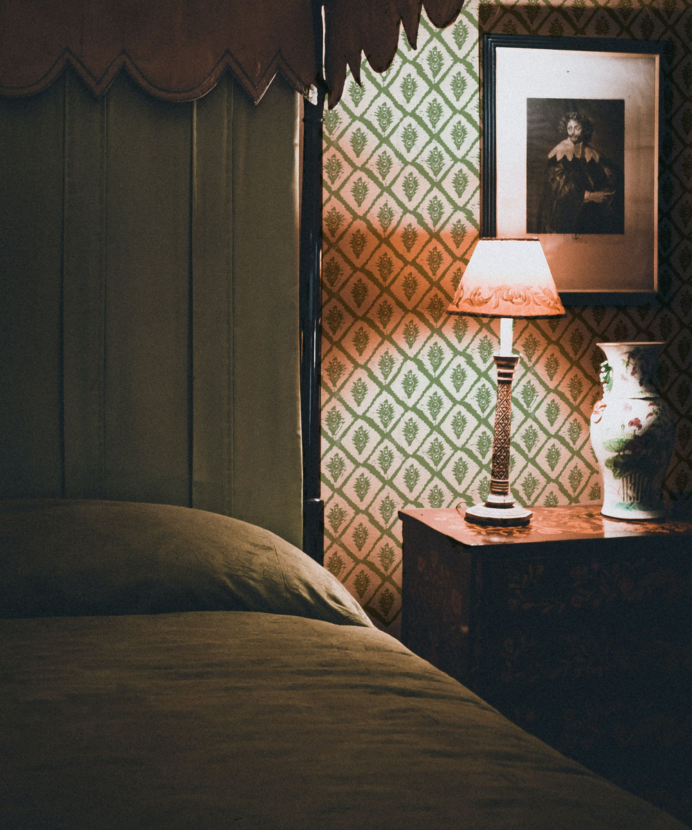 annika-reed-studio-jaipur-design-wallpaper-green-hand-block-printed-repeat-pattern-white-background-bedroom