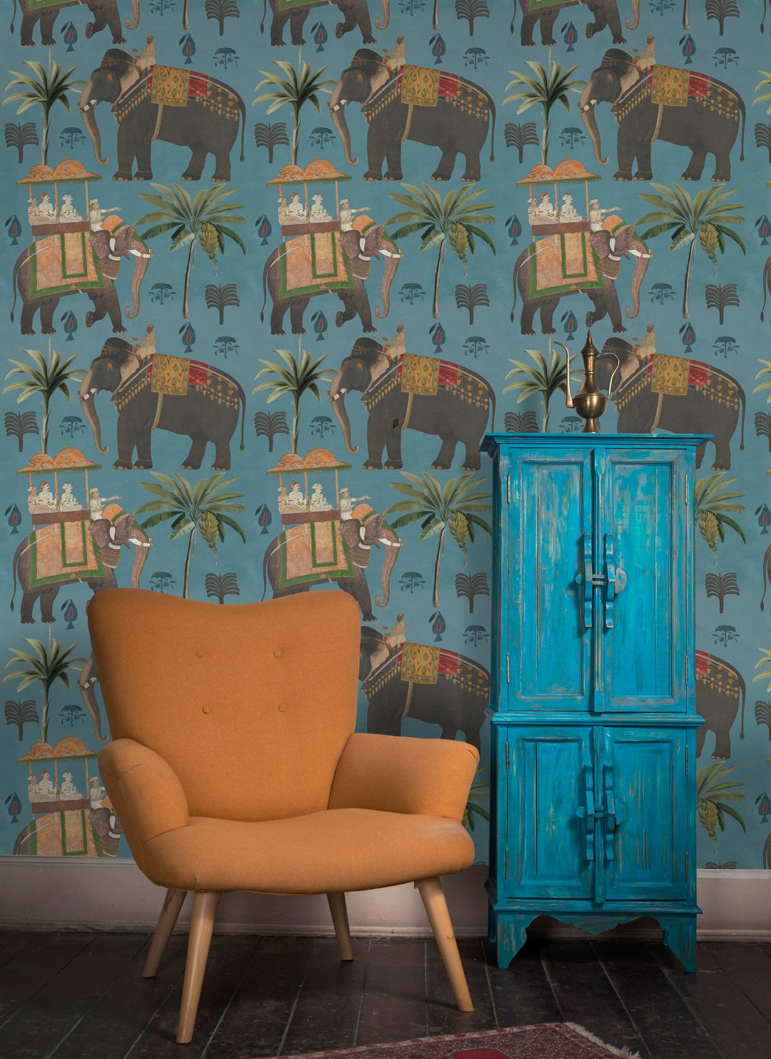 mind-the-gap-the-procession-blue-wallpaper-the-mysterious-traveller-collection-blue-background-elephants-indian-culture-travelling-interior