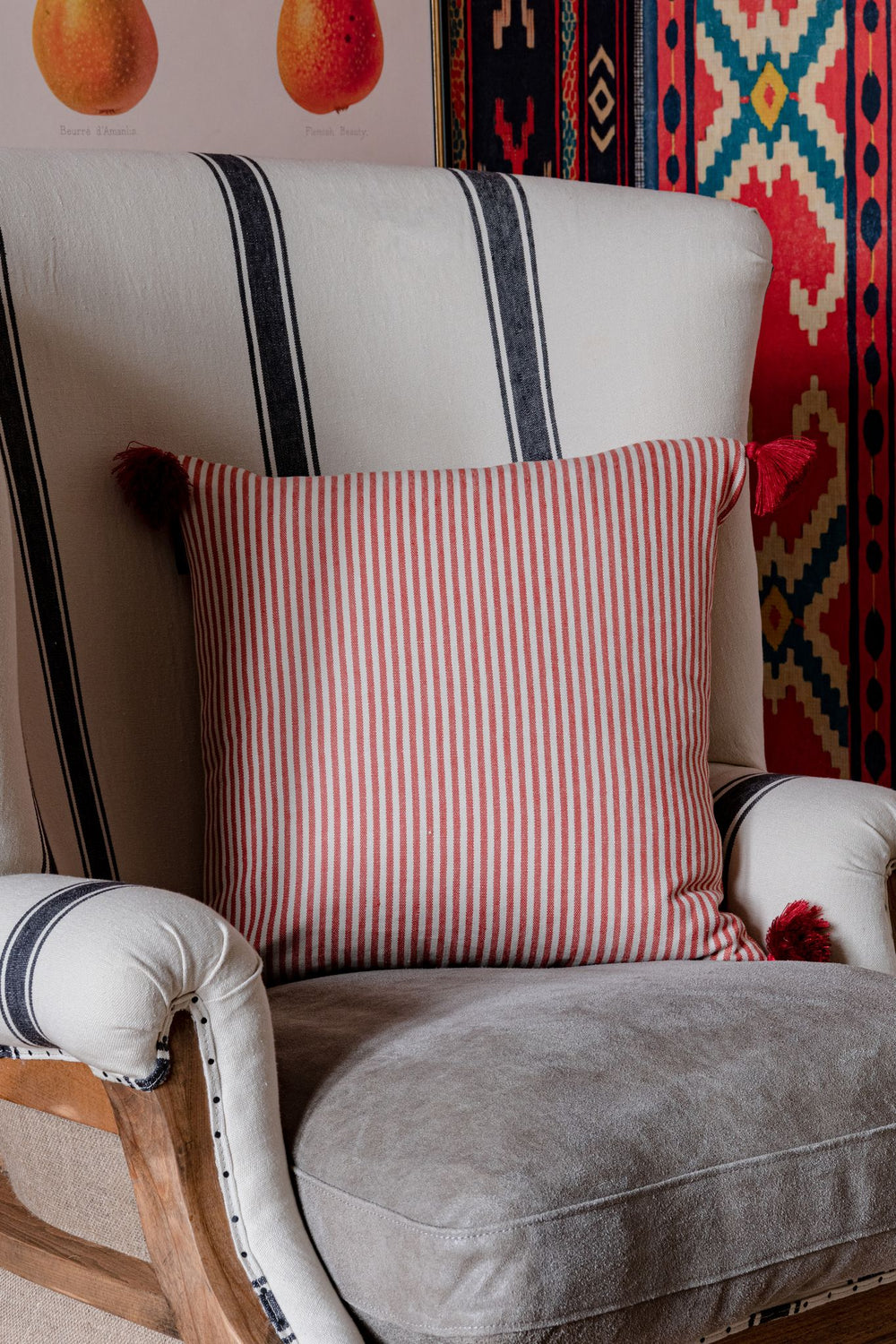 rhubarb-stripe-linen-cushion-red-white-red-tassel-mind-the-gap-black-white-armchair