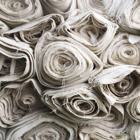Lowri-textiles-Viola-ditsy-fabric-crinckle-rust-terracotta-textile-printed-linen-cotton-flowers-white-spots-