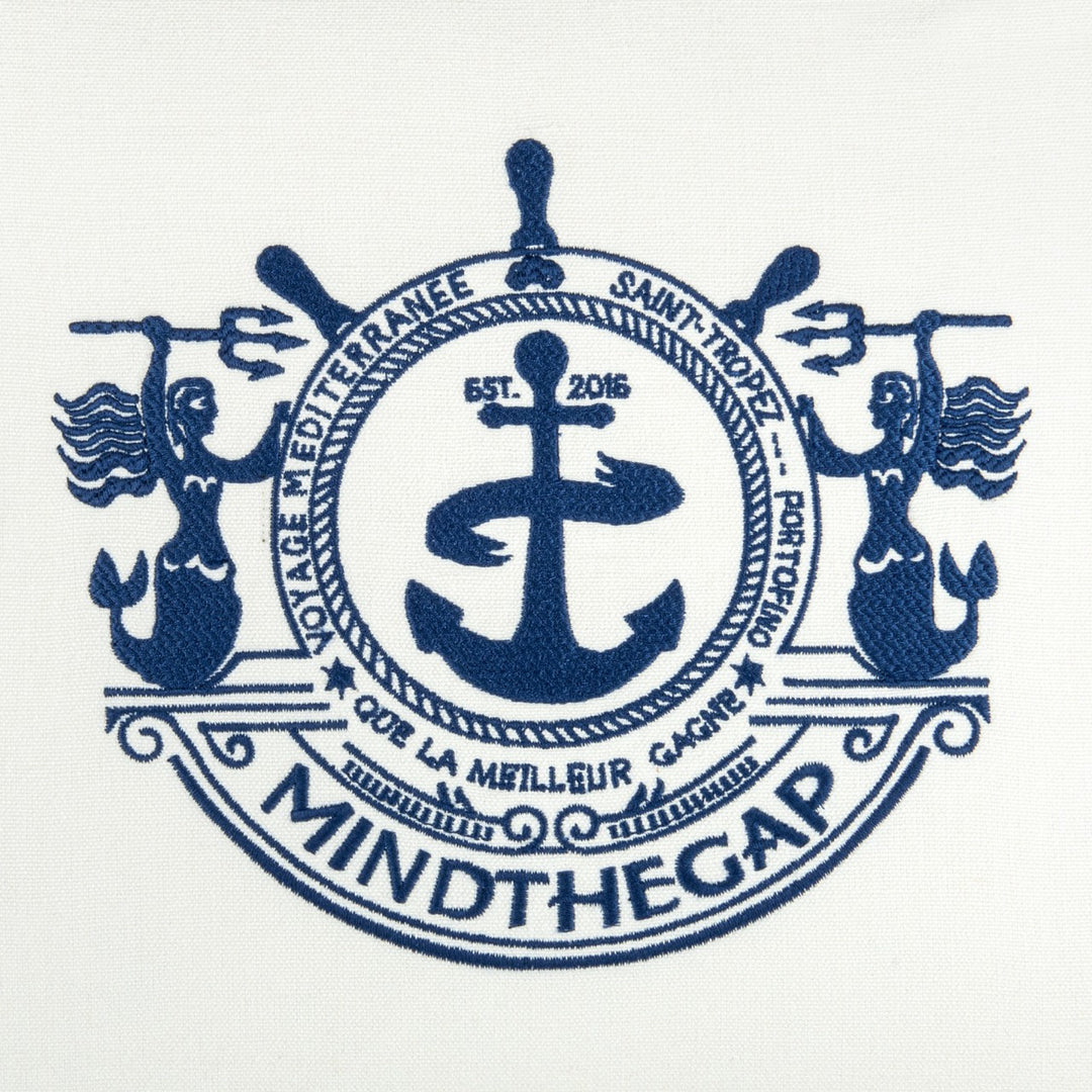 Mind-the-gap-voyage-cushion-white-cushion-blue-rope-cord-trim-anchor-embroidered-logo-white-linen- LC40105