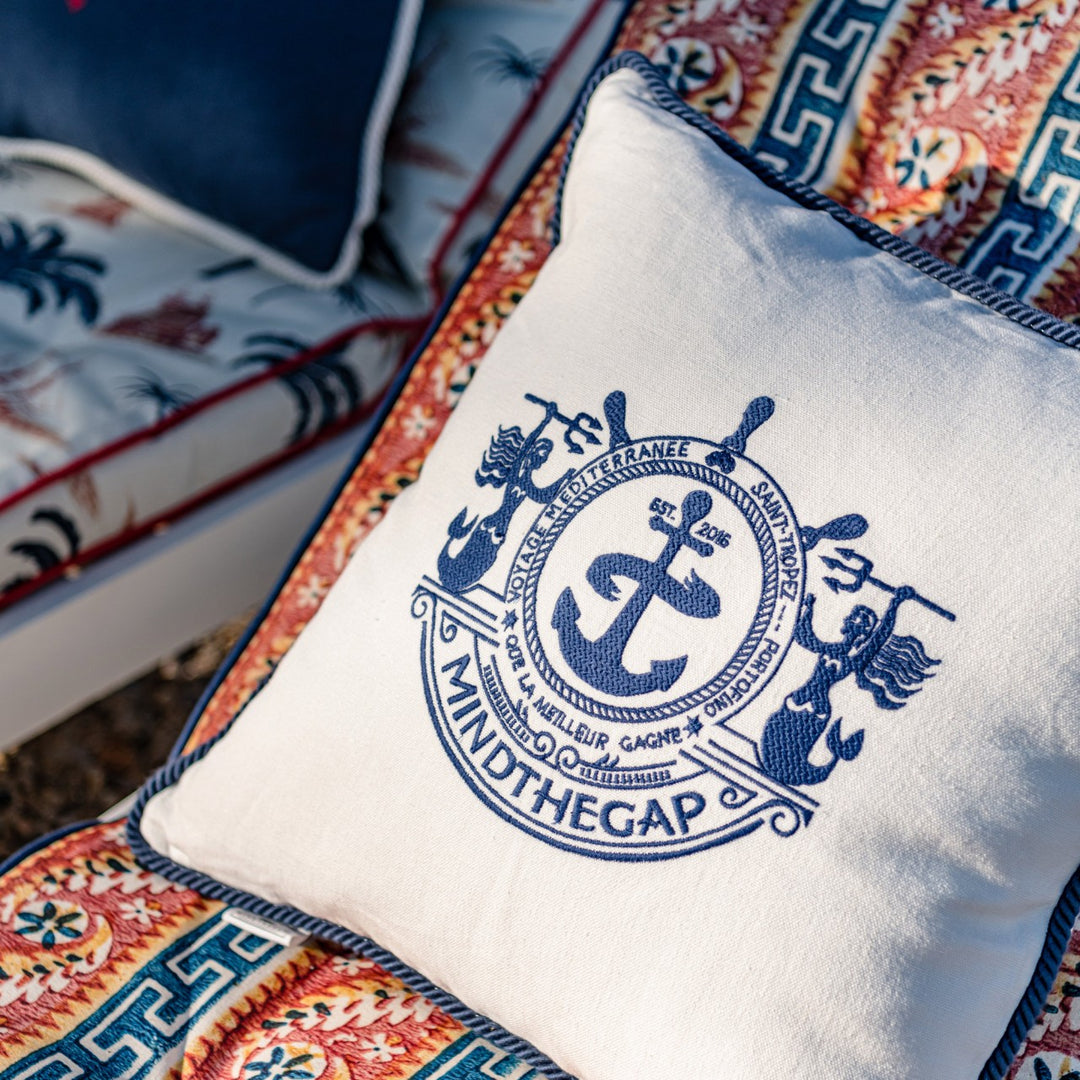 Mind-the-gap-voyage-cushion-white-cushion-blue-rope-cord-trim-anchor-embroidered-logo-white-linen- LC40105 